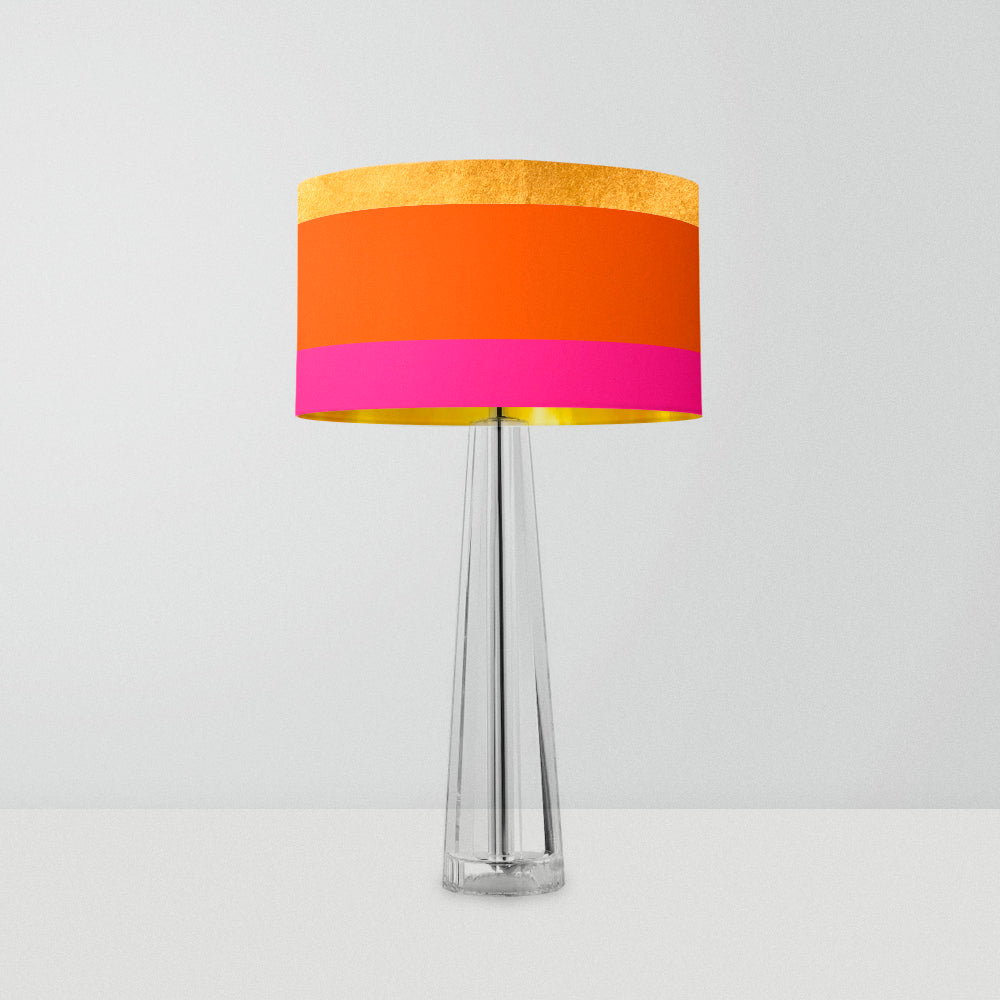 drum lampshade featuring three bold stripes in gold, bright orange, and pink