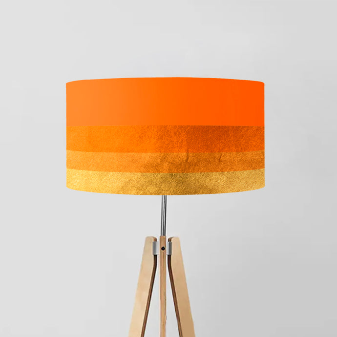 The design features a seamless transition from a rich, deep orange at the top to a radiant, shimmering gold at the bottom