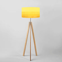 Load image into Gallery viewer, Gradient yellow-gold drum lampshade on tripod floor lamp, diameter 40cm, modern and elegant design for contemporary interiors.
