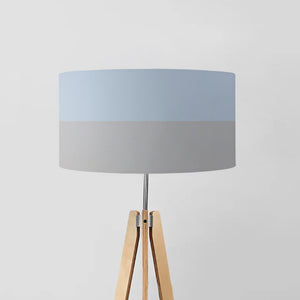 light blue top transitioning into a soothing light grey bottom, this lampshade is a testament to modern elegance.