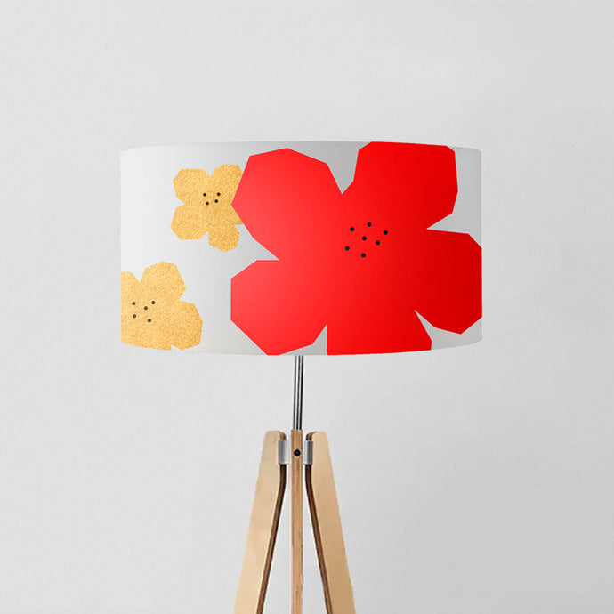 Add a touch of elegance and vibrancy to your home with our drum lampshade featuring a geometric abstract design showcasing big red and two gold flowers