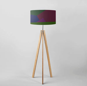 The lampshade's design features a harmonious interplay of vibrant hues