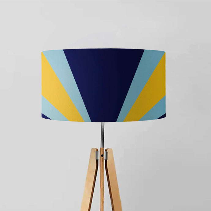 drum lampshade features a contemporary and abstract geometric design of ballet dancers in motion