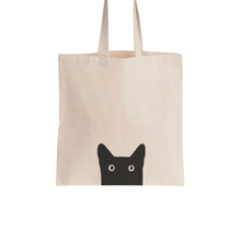 Load image into Gallery viewer, This is a cotton tote bag featuring a contemporary design of a black cat.