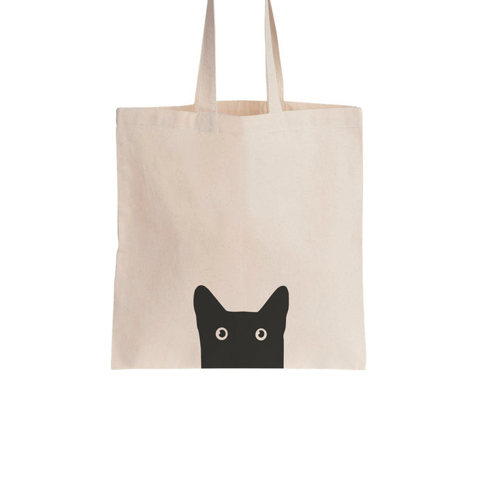 This is a cotton tote bag featuring a contemporary design of a black cat.