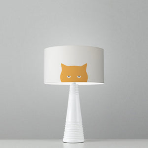 small drum lampshade featuring an irresistible and whimsical grumpy ginger cat design